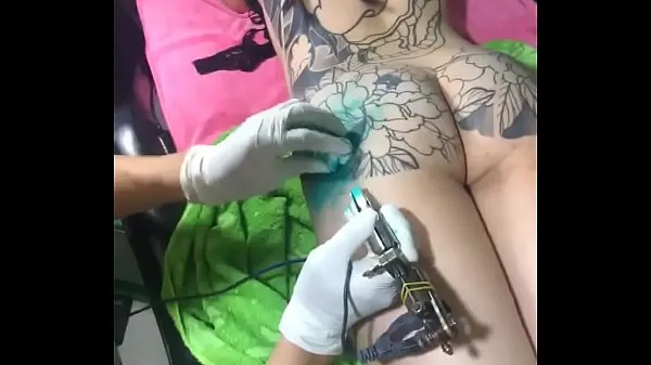 Novi videoposnetki Asian full body tattoo in Vietnam energije