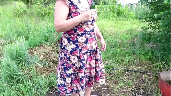 New Busty milf masturbates with cucumber and strawberries outdoors in a public place Juicy PAWG and big tits in nature Fetish energy Videos