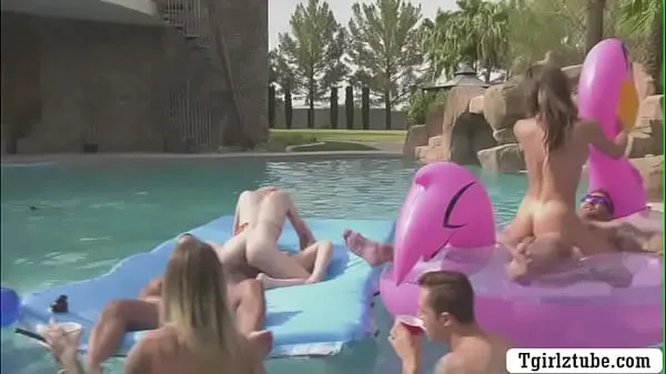 New Busty shemales are in the swimming pool with many guys that,they decide to do orgy and they start kissing each is,they suck their big cocks passionately and they let them bareback their wet ass too energy Videos