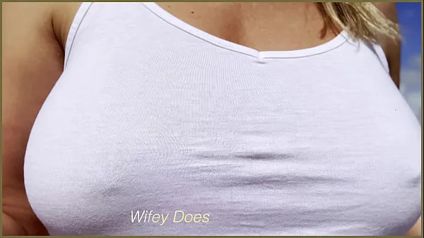 New SEXY MILF public exhibitionist dare - wet shirt in public and lets stranger poor water on her braless boobs energy Videos